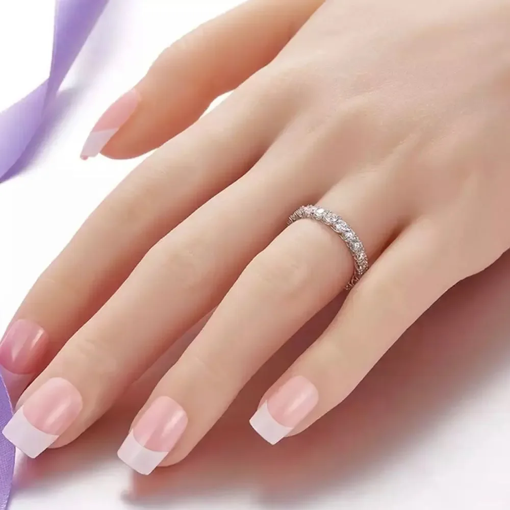 Round brilliant eternity wedding band